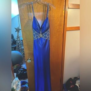 Long royal blue silky prom dress with mesh rhinestone detailing. Only worn once.